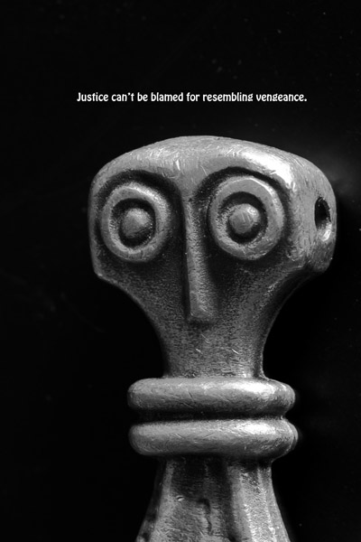 Base of handle on Thor's hammer.  Text by Dartwill Aquila